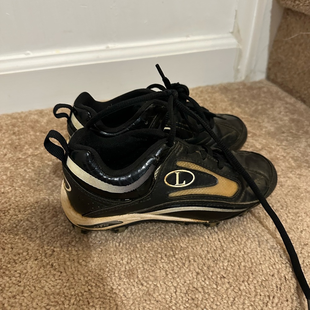 L Kids Black and Gold Sneakers